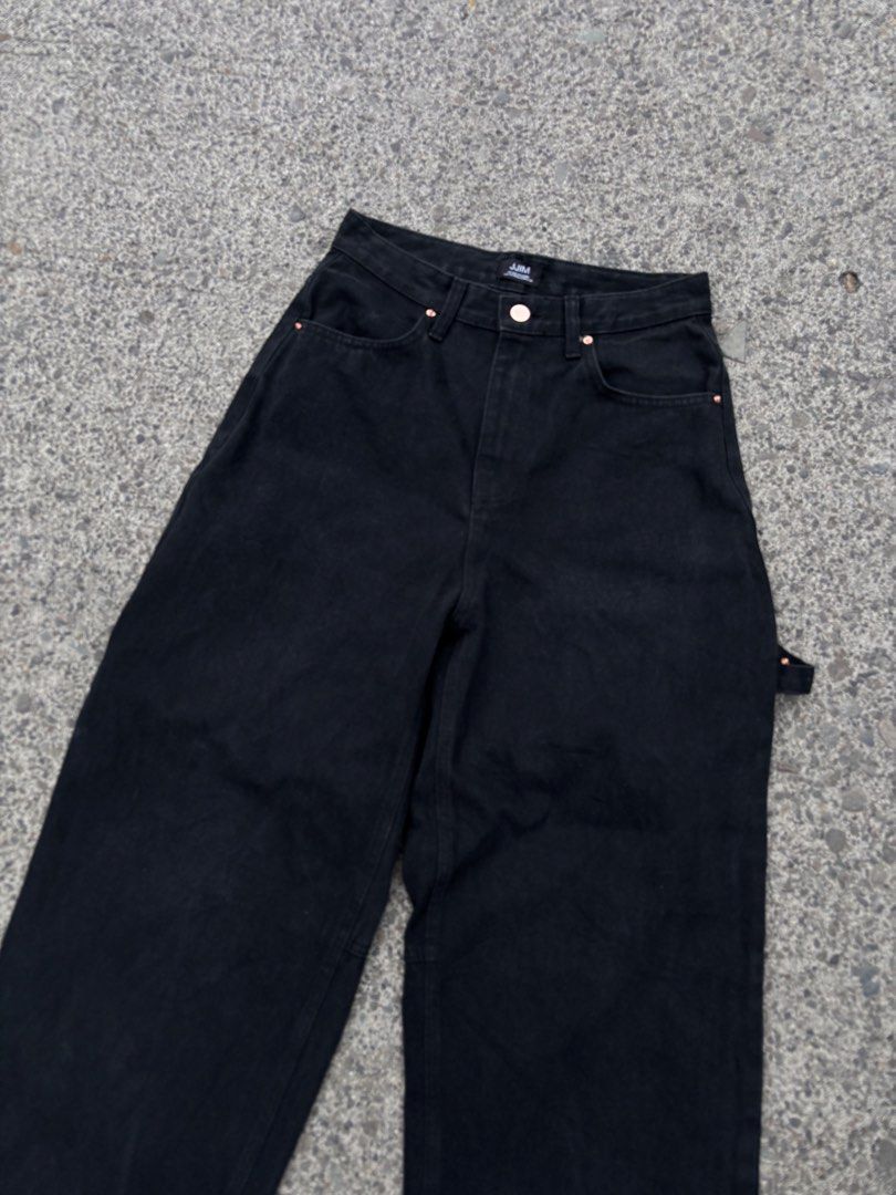 JJIM Black Denim Carpenter Pants (Category: Jeans) located in Lapu Lapu. Submitted by thatdamngrails (Listing ID 1468968401, Image 3). Description: - Brand: JJIM - Size: 30 - Style: Black denim carpenter pants with a relaxed wide leg fit - Details: Classic side utility loop and contrast metallic buttons and rivets - Color: Solid washed black - Condition: Great streetwear staple for casual daily fits - Mode of Payment: GCash, BPI, or Maya - Shippi