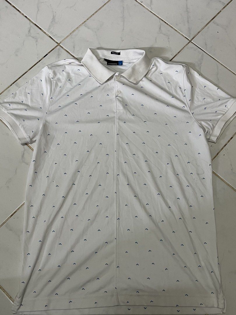 j.lindeberg aop poloshirt (Category: Luxury Apparel) located in Muntinlupa City. Submitted by buymothriftko (Listing ID 1468936339, Image 1). Description: j.lindeberg aop poloshirt size:large width:23 length:27 in xcellent condition 1200 only.