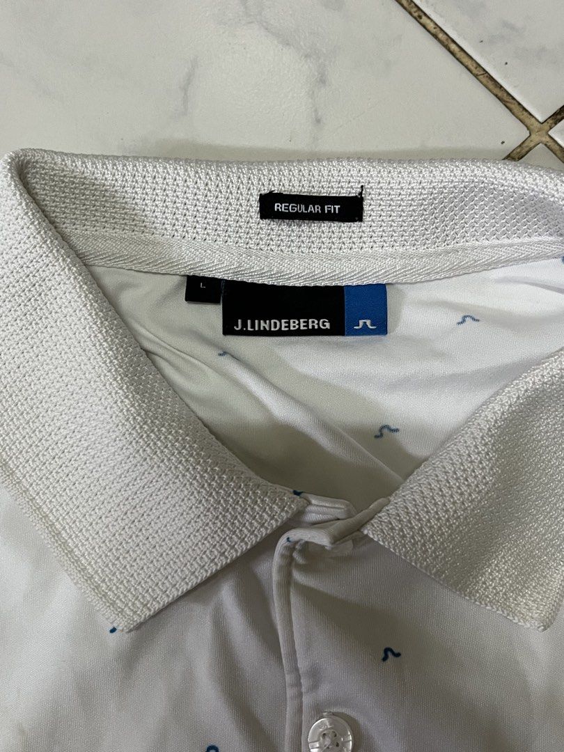 j.lindeberg aop poloshirt (Category: Luxury Apparel) located in Muntinlupa City. Submitted by buymothriftko (Listing ID 1468936339, Image 2). Description: j.lindeberg aop poloshirt size:large width:23 length:27 in xcellent condition 1200 only.
