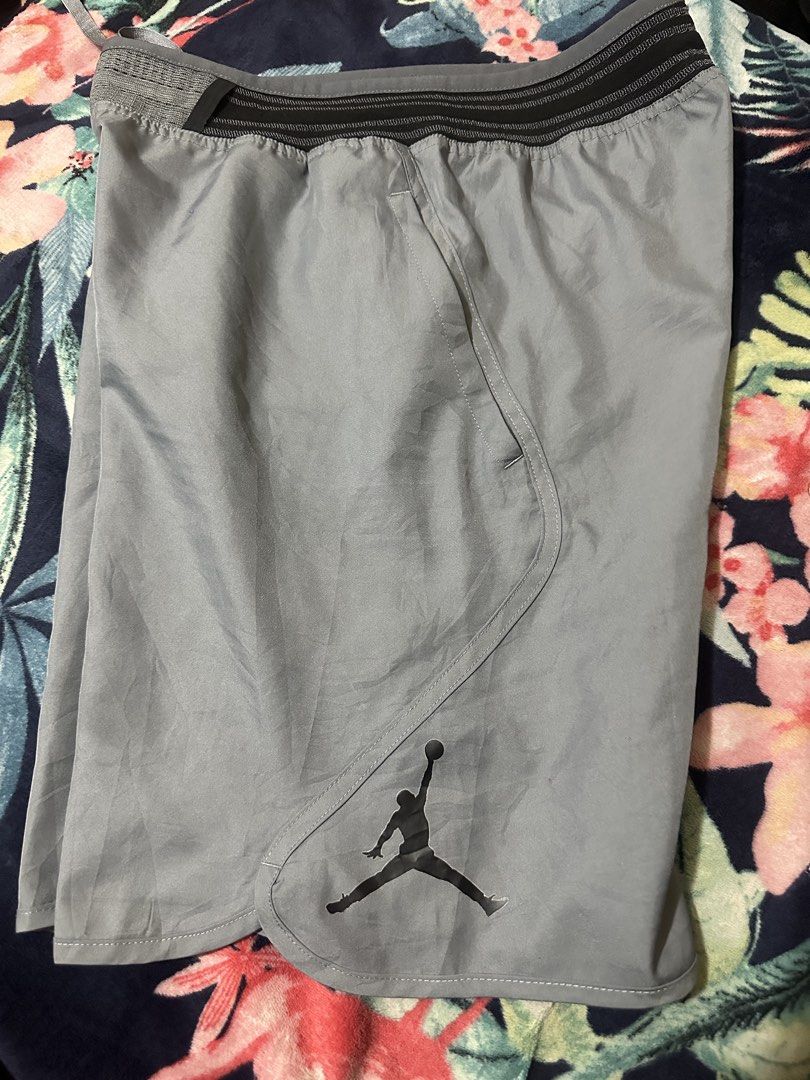 Jordan Dri-Fit Grey Athletic Shorts Size M (Category: Shorts) located in Cauayan City . Submitted by onins28 (Listing ID 1469068002, Image 1). Description: - Brand: Jordan - Color: Grey - Size: Medium - Technology: Nike Dri-Fit for moisture management - Design: Elastic waistband with striped details & large Jumpman logo on the left leg - Features: Inner mesh lining - Origin: Made in Thailand - Tag Code: B21918-085 - Condition: 100% authentic, per