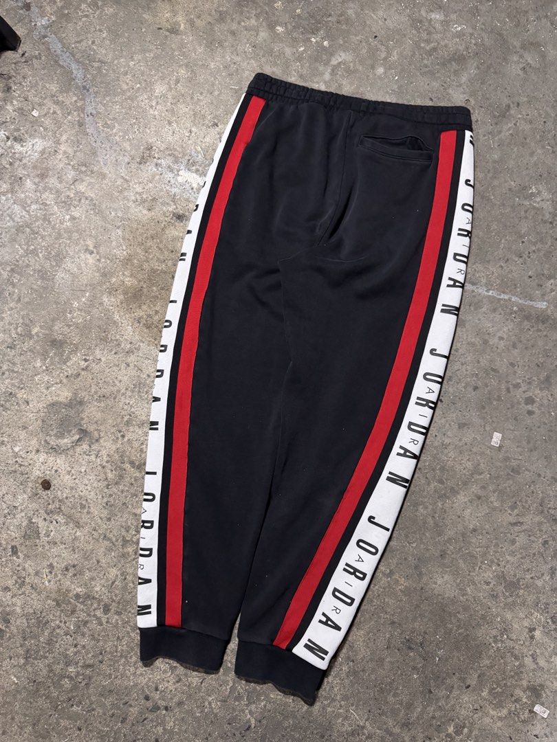 Jordan side type jogger pants (Category: Joggers) located in Pasig City. Submitted by dripthrift1600 (Listing ID 1469081442, Image 2). Description: - Jordan Side type Jogger pants - Excellent Condition - Issue: None - Dimes: 30x38x5.