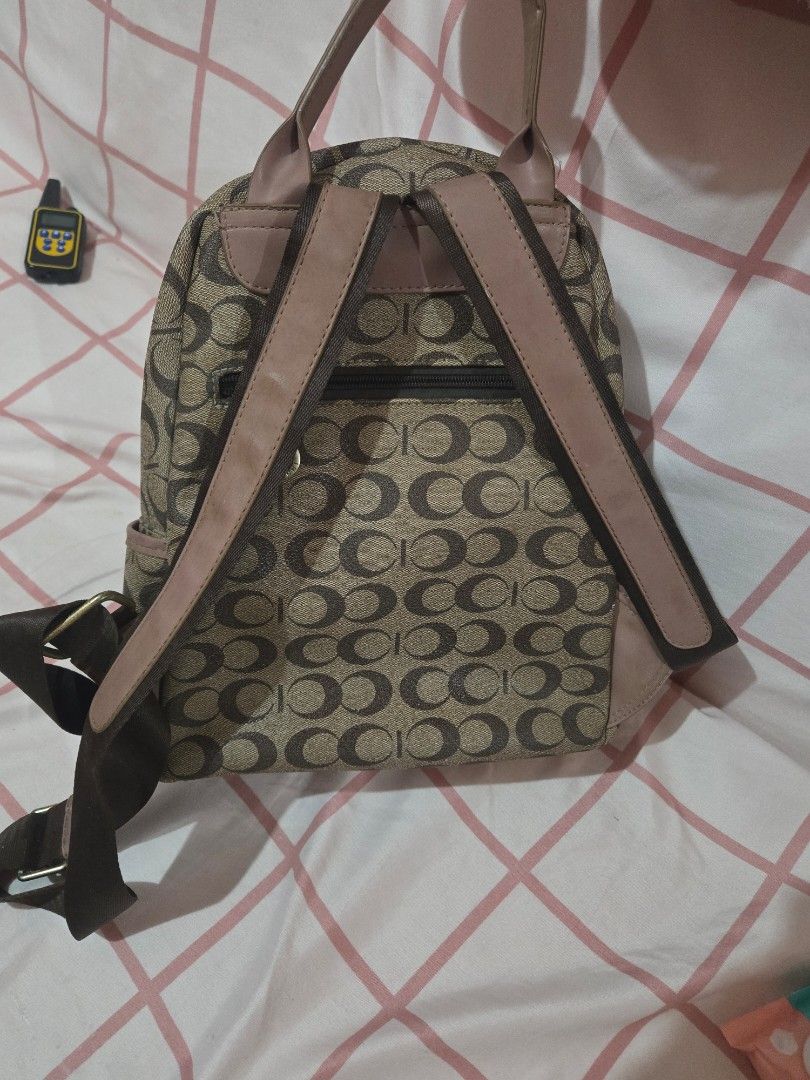 Jovanni C design bagpack (almost coach dupe) (Category: Backpacks) located in Manila. Submitted by misushoppa (Listing ID 1469027001, Image 3). Description: 🎀 Original price: ₱2,500 Condition: 9.5/10 (almost new!) no issue with many compartments color: pink & brown Decluttering one of my favorite bags! 🥹💕 Limited-edition design na hindi na available ngayon sa store. Maganda siya in person, and honestly, maraming friends na ilang beses na itong