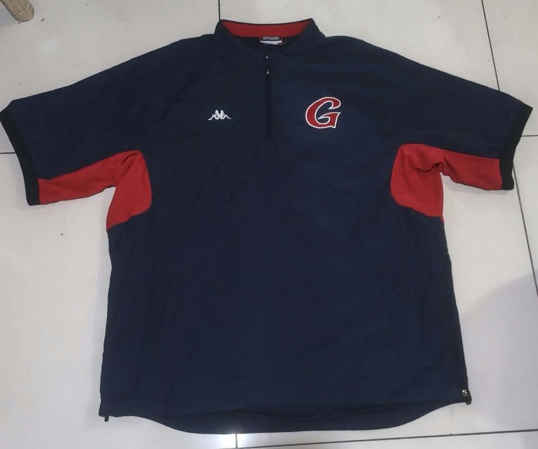 Kappa Navy Blue Red Short Sleeve Half Zip Jacket (Category: Coats, Jackets and Outerwear) located in San Carlos City. Submitted by dhong_abay_thrift (Listing ID 1468978554, Image 1). Description: - Brand: Kappa - Color: Navy blue and red - Style: Short sleeve half-zip jacket with high red collar - Details: Large embroidered 'G' on the chest, classic Kappa logo on the right side - Material: Lightweight and comfortable - Extra Feature: Zippered bot