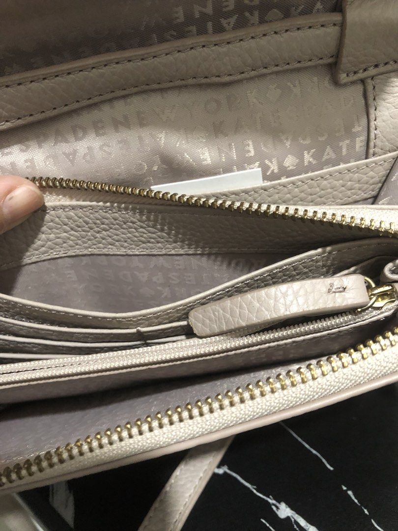 Kate Spade Bag (Category: Cross-body Bags) located in Quezon City. Submitted by attraxion (Listing ID 1468998348, Image 3). Description: Preloved, like new condition Sling wallet Multiple cardlots .