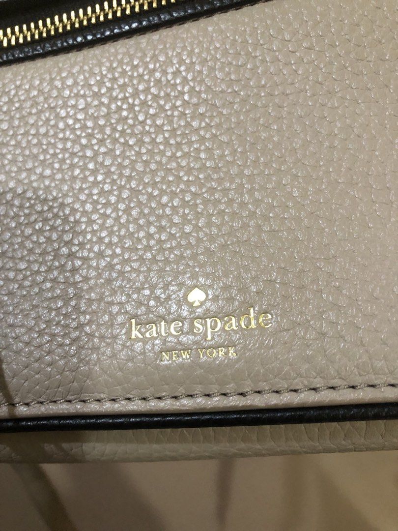 Kate Spade Bag (Category: Cross-body Bags) located in Quezon City. Submitted by attraxion (Listing ID 1468998348, Image 2). Description: Preloved, like new condition Sling wallet Multiple cardlots .