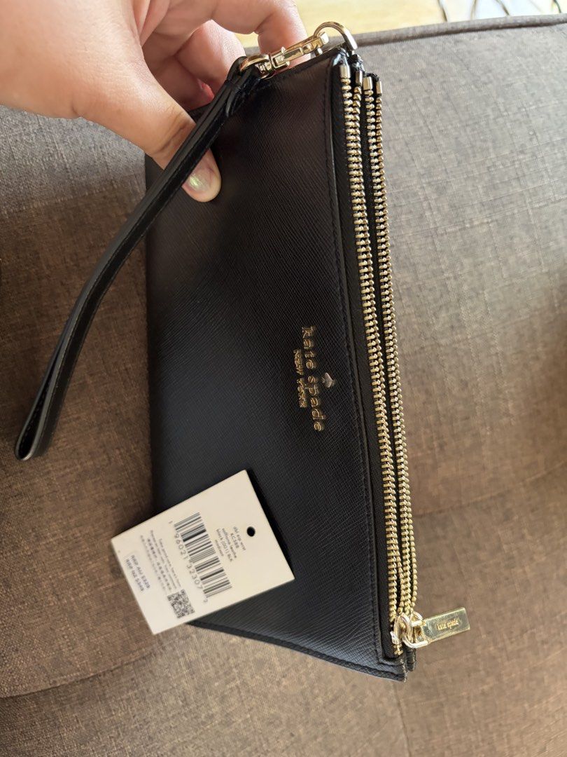 Kate Spade Madison Double Zip Wristlet (Category: Luxury Bags & Wallets) located in Bulacan. Submitted by keendeer_8788ef (Listing ID 1469042257, Image 2). Description: Bought on physical store of Kate Spade in Australia Only used 1 or 2 times Last picture is just reference on the internet (for reference only).