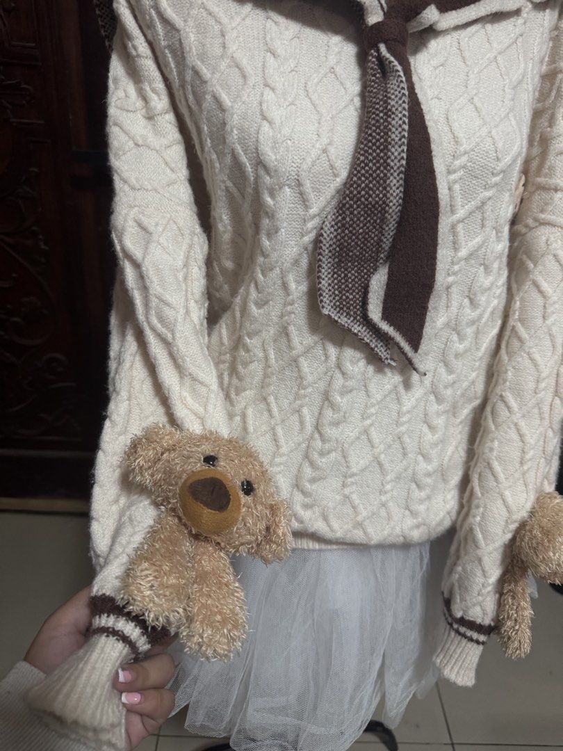 Kawaii Bear Sailor Collar Cable Knit Sweater (Category: Coats, Jackets and Outerwear) located in Manila. Submitted by athanaxia (Listing ID 1469058447, Image 3). Description: - Cream cable knit sweater with brown sailor collar - Big bear graphic embroidered on the back sailor flap - Cute attached plush teddy bears on both sleeves - Front neck tie detail - Cozy, thick winter knit with an oversized fit.