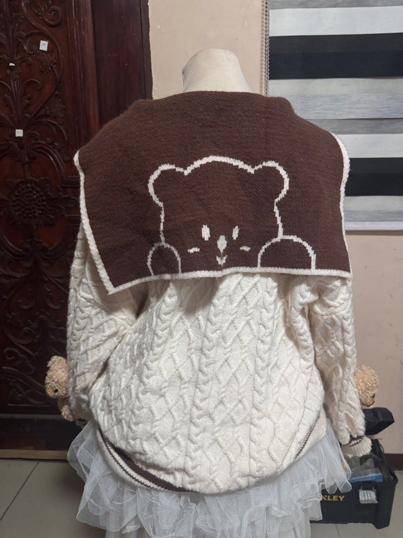 Kawaii Bear Sailor Collar Cable Knit Sweater (Category: Coats, Jackets and Outerwear) located in Manila. Submitted by athanaxia (Listing ID 1469058447, Image 2). Description: - Cream cable knit sweater with brown sailor collar - Big bear graphic embroidered on the back sailor flap - Cute attached plush teddy bears on both sleeves - Front neck tie detail - Cozy, thick winter knit with an oversized fit.