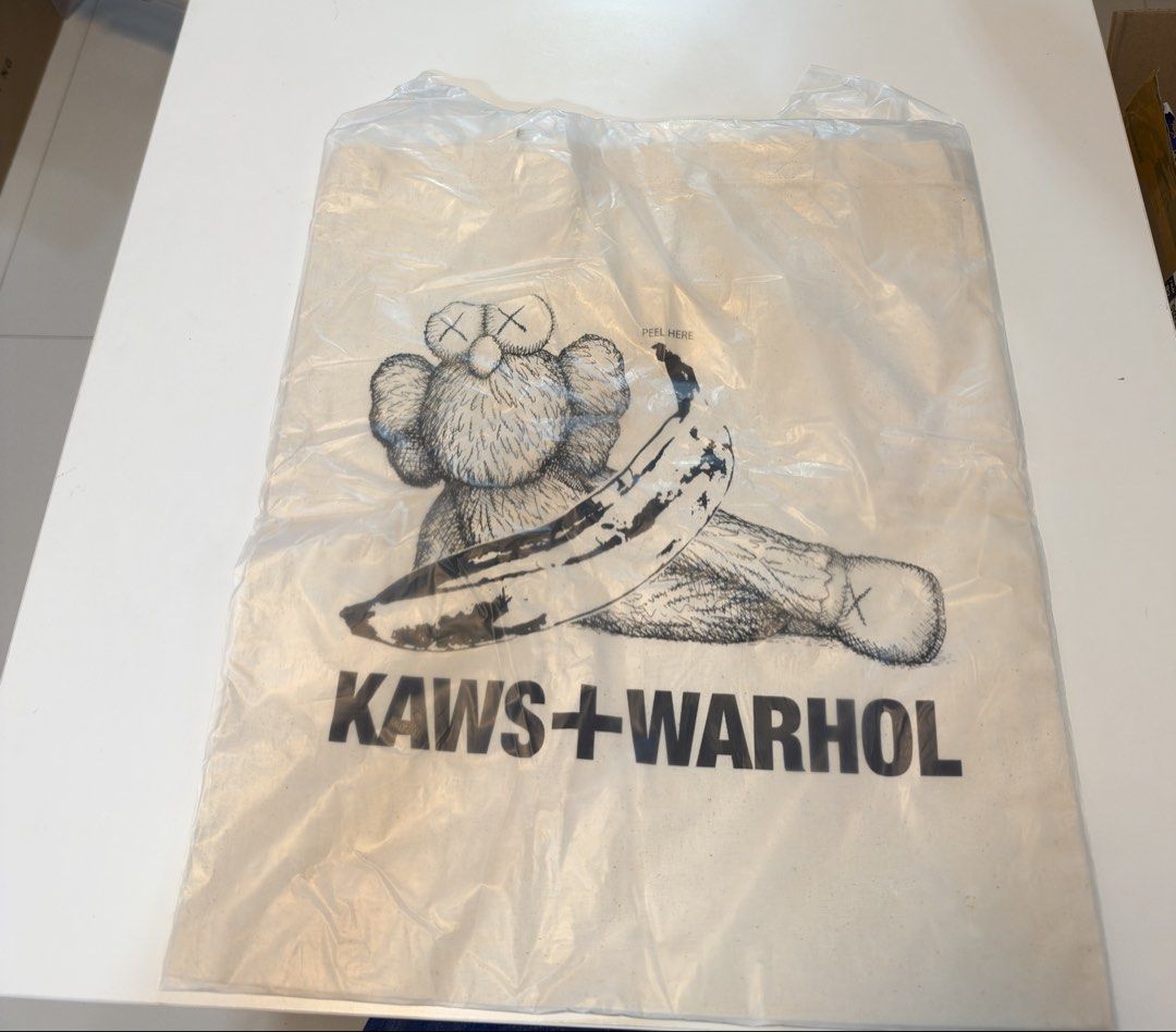 Kaws Uniqlo totebag (Category: Belt bags, Clutches and Pouches) located in Naic. Submitted by yozaktcg (Listing ID 1469008021, Image 1). Description: Never been used, brand new.