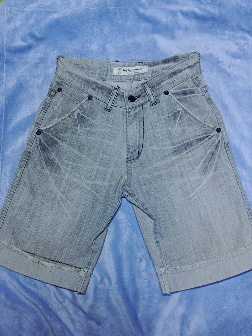 Kello Jeans Grey Denim Shorts (Category: Shorts) located in City of Isabela. Submitted by warmbird.d06e6f (Listing ID 1469082597, Image 1). Description: - Brand: Kello Jeans - Color: Light grey denim - Rise: Mid-rise waist - Closure: Classic button fly - Design: Stylish whiskering on front pockets - Hem: Rolled cuffs with frayed edges - Style: Great for casual streetwear outfits.