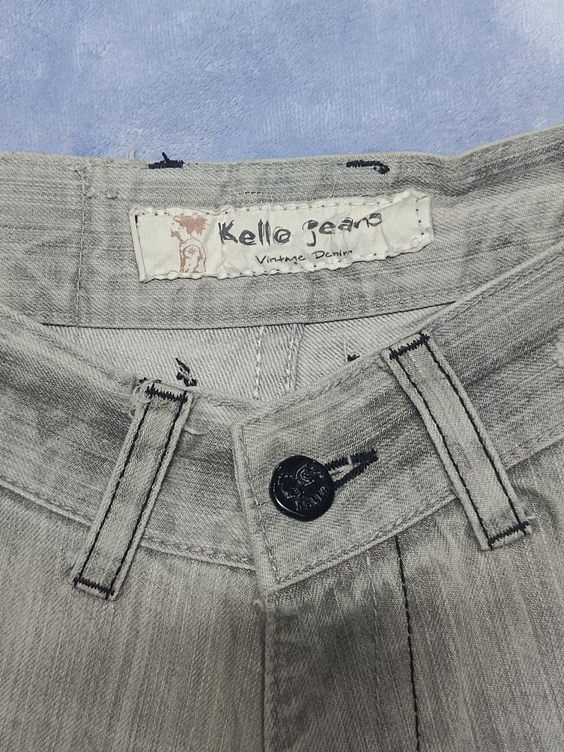 Kello Jeans Grey Denim Shorts (Category: Shorts) located in City of Isabela. Submitted by warmbird.d06e6f (Listing ID 1469082597, Image 2). Description: - Brand: Kello Jeans - Color: Light grey denim - Rise: Mid-rise waist - Closure: Classic button fly - Design: Stylish whiskering on front pockets - Hem: Rolled cuffs with frayed edges - Style: Great for casual streetwear outfits.