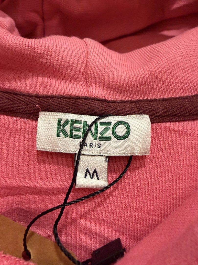 Kenzo (authentic) (Category: Coats, Jackets and Outerwear) located in Quezon City. Submitted by macleen17 (Listing ID 1469014956, Image 3). Description: Kenzo Size M Exllent Condition Two Colors Big logo Embroidery Design in front Made in Portugal.