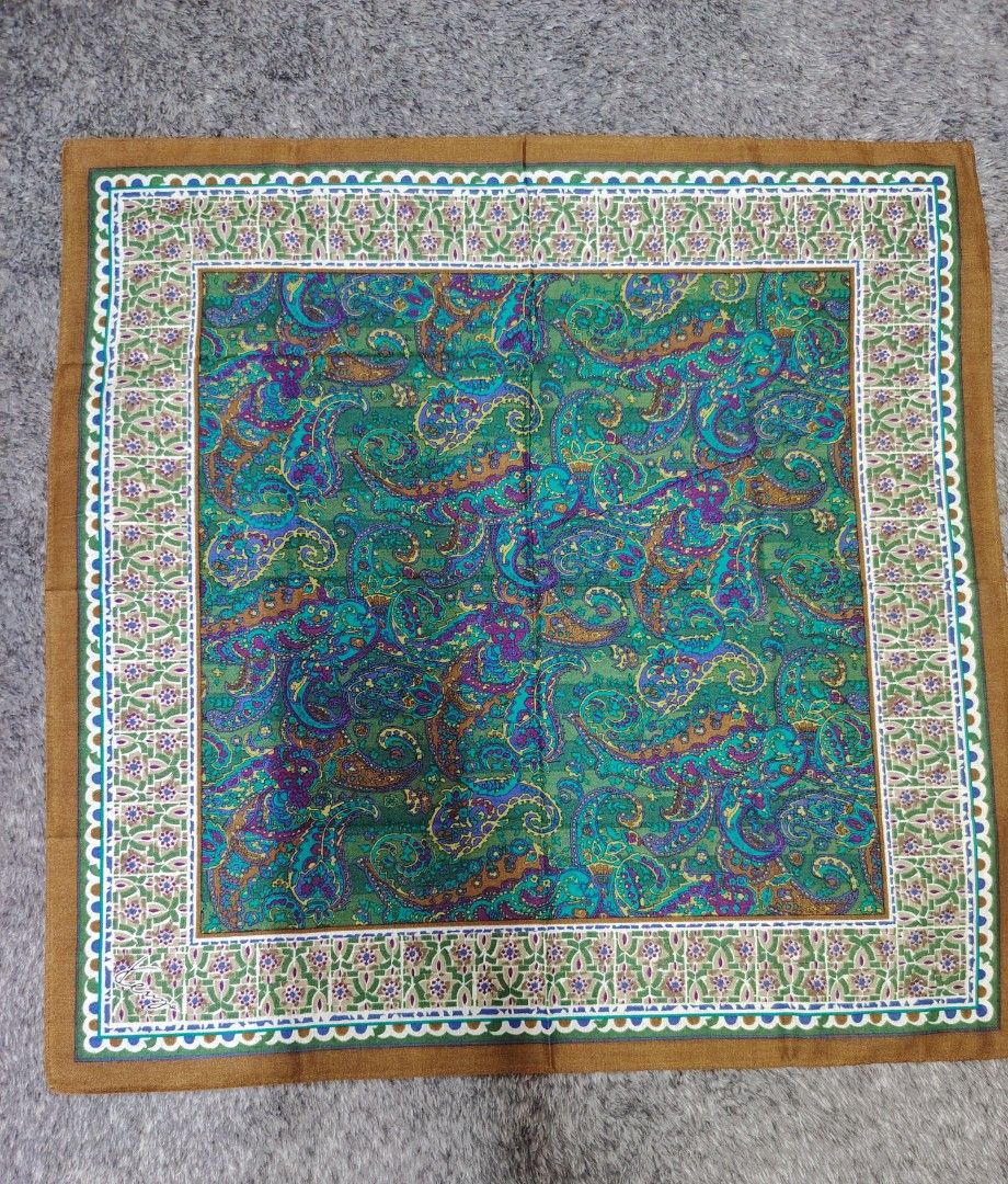 KENZO PANYO 180 each (Category: Handkerchief & Pocket Squares) located in Valenzuela. Submitted by anna.banana10 (Listing ID 1469094744, Image 2). Description: - Set of 3 authentic Kenzo handkerchiefs - Design: Vibrant green and brown paisley pattern with elegant floral borders - Size: 50 x 50 cm - Condition: Unused and carefully stored - Perfect as a gift or a stylish accessory.