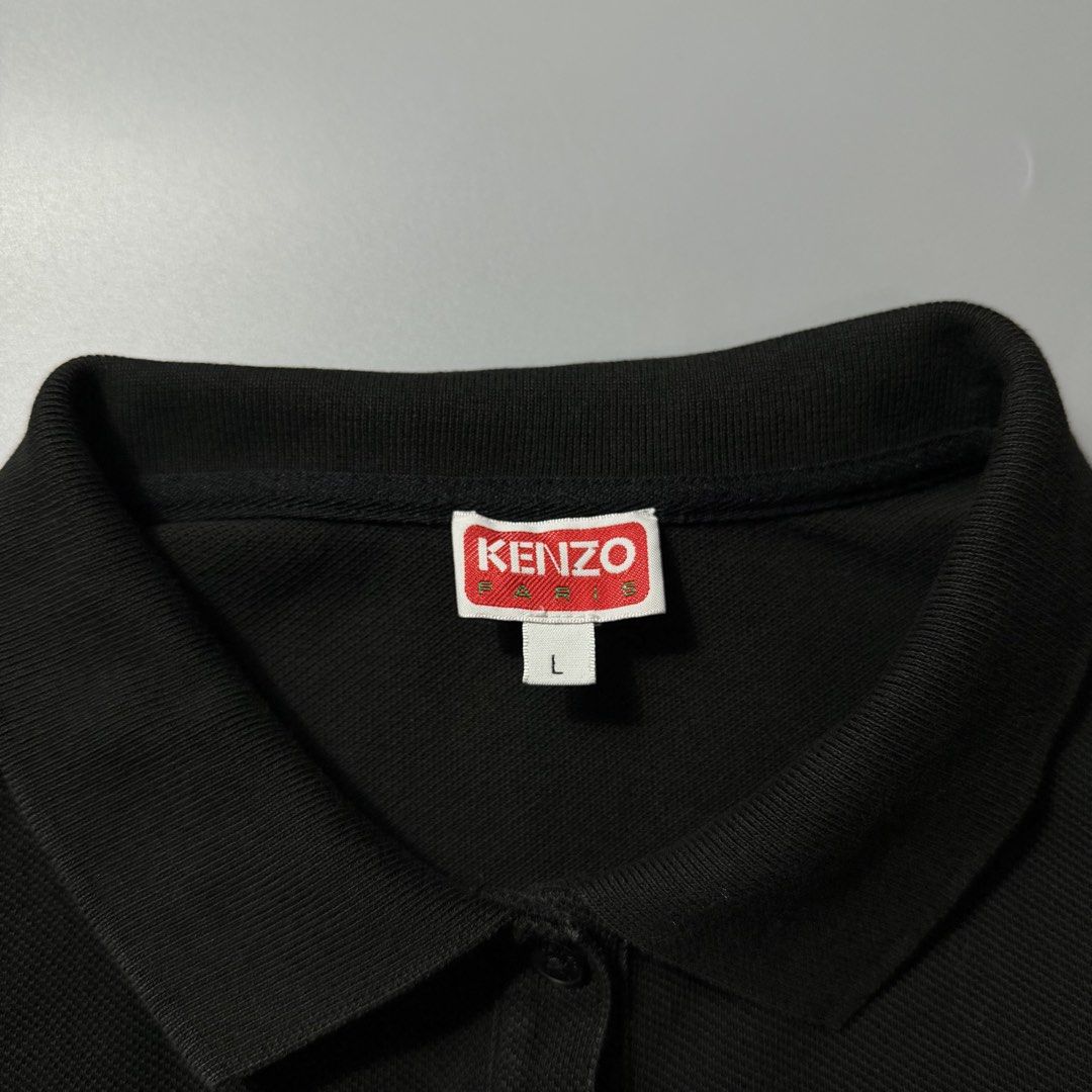 Kenzo Paris Black Polo Shirt (Category: Tshirts & Polo Shirts ) located in Dagupan City. Submitted by dgp.plvg (Listing ID 1468957014, Image 3). Description: KENZ0 PARIS BOKE FLOWER SIDE LOGO EMBROIDERED POLO SHIRT Size: Large Width: 19.5” Length: 24” Condition: good as new Issues: none. Mine: ₱3,500.