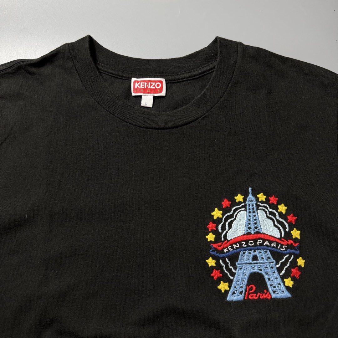 Kenzo Paris Eiffel Tower Black T-Shirt (Category: Tshirts & Polo Shirts ) located in Dagupan City. Submitted by dgp.plvg (Listing ID 1468956006, Image 2). Description: KENZ0 PARIS DRAWN VARSITY EMBROIDERED TEE Size: Large Width: 20” Length: 26.5” Condition: good as new Issues: none. Mine: ₱3,000.