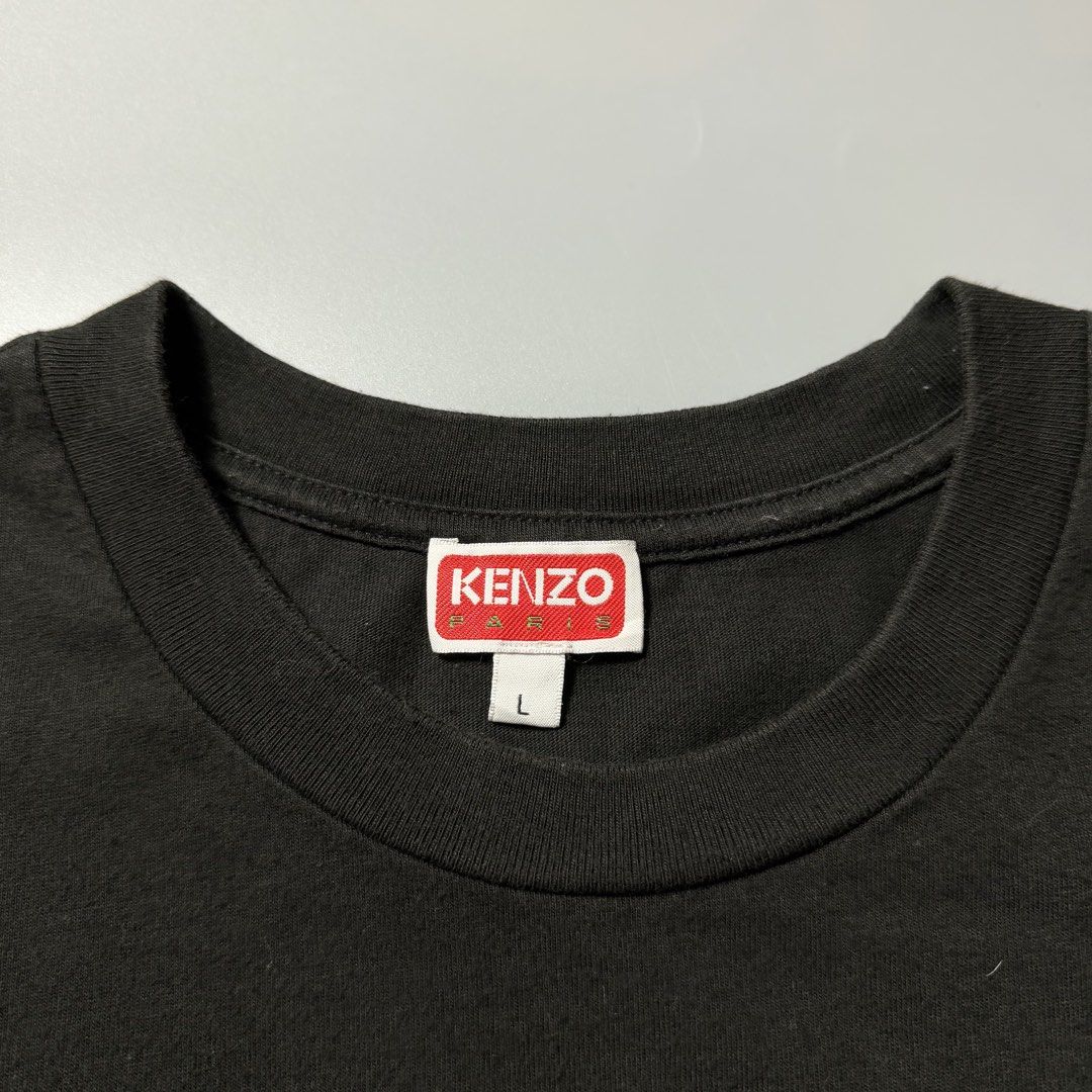 Kenzo Paris Eiffel Tower Black T-Shirt (Category: Tshirts & Polo Shirts ) located in Dagupan City. Submitted by dgp.plvg (Listing ID 1468956006, Image 3). Description: KENZ0 PARIS DRAWN VARSITY EMBROIDERED TEE Size: Large Width: 20” Length: 26.5” Condition: good as new Issues: none. Mine: ₱3,000.