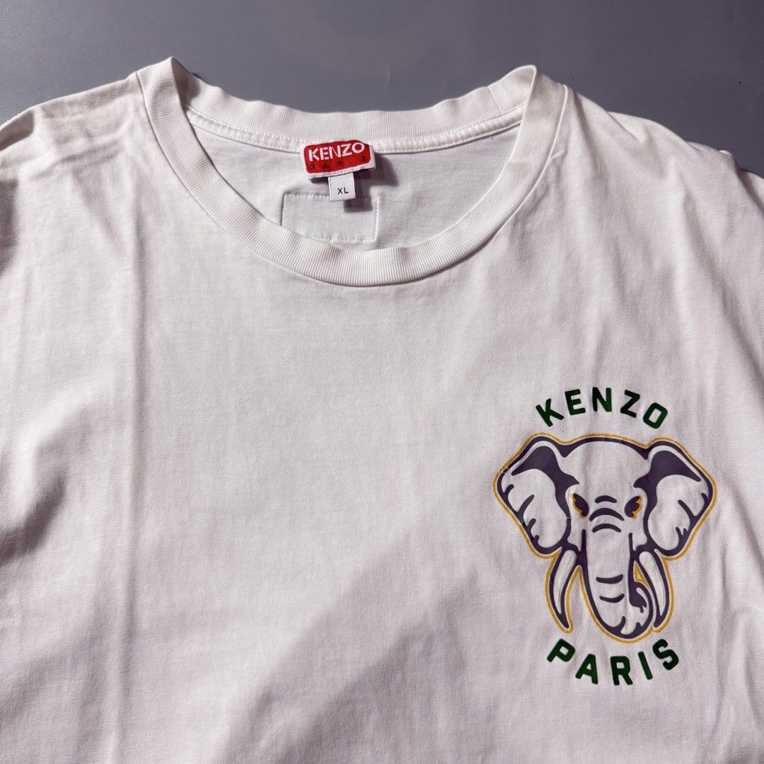 Kenzo Paris Elephant Graphic White Tee (Category: Tshirts & Polo Shirts ) located in Dagupan City. Submitted by dgp.plvg (Listing ID 1468955913, Image 2). Description: KENZ0 PARIS ELEPHANT POCKET TEE Size: XL Width: 22.5-23” Length: 29.5” Condition: Excellent Issues: none. signs of usage only Mine: ₱3,000.