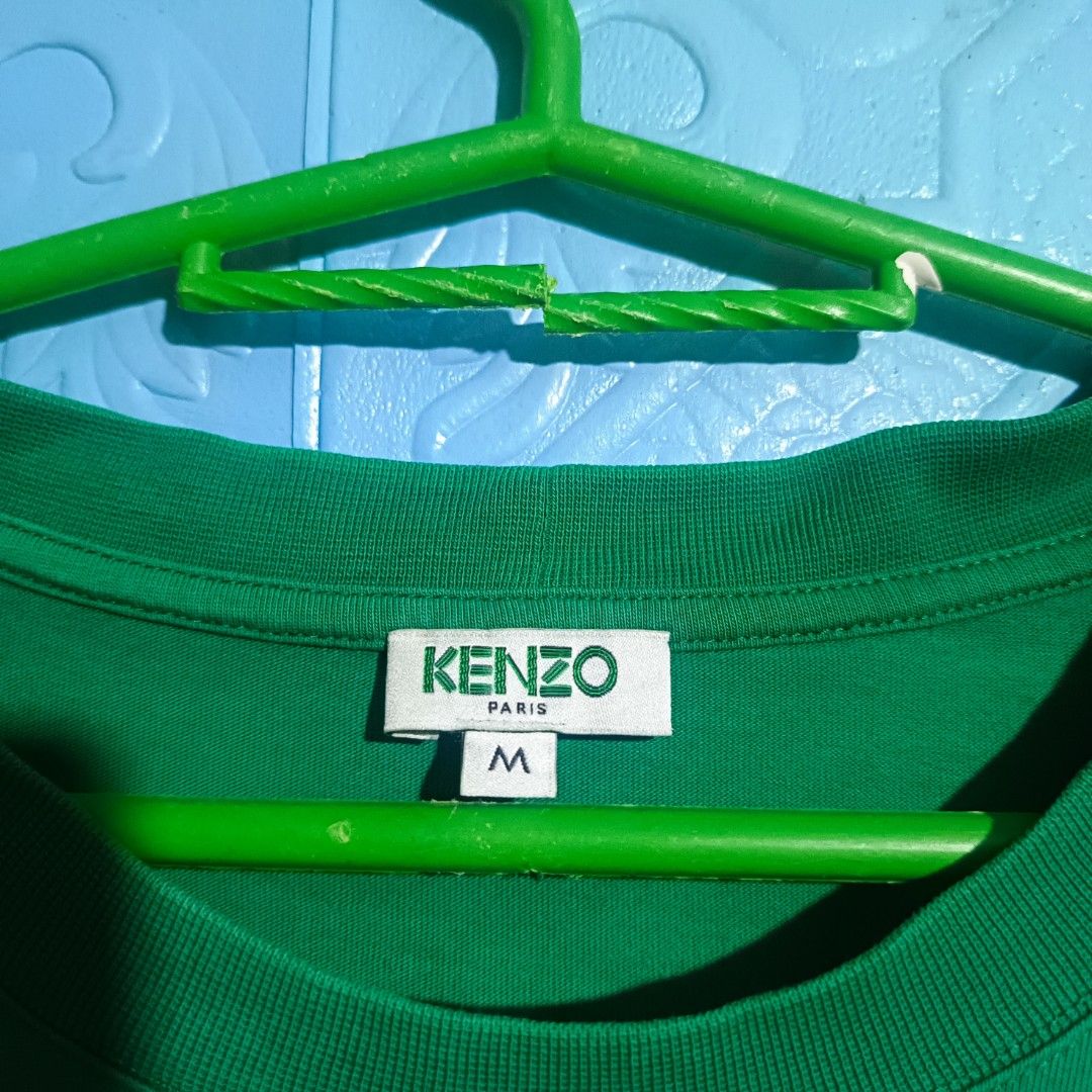 KENZO PARIS TSHIRT (Category: Activewear) located in Quezon City. Submitted by zoesmithshop (Listing ID 1469103937, Image 3). Description: KENZO PARIS GREEN TSHIRT AUTHENTIC SIZE- MEDIUM TO LARGE ISSUE MAY BUTAS SA LIKOD NG BALIKAT.