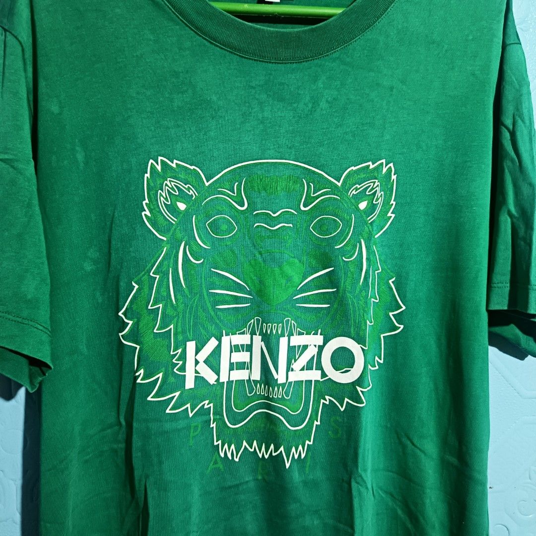 KENZO PARIS TSHIRT (Category: Activewear) located in Quezon City. Submitted by zoesmithshop (Listing ID 1469103937, Image 2). Description: KENZO PARIS GREEN TSHIRT AUTHENTIC SIZE- MEDIUM TO LARGE ISSUE MAY BUTAS SA LIKOD NG BALIKAT.
