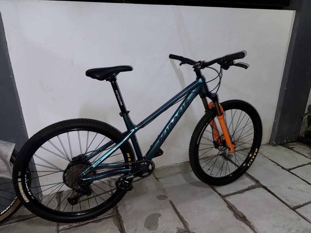 kinesis mtb 29er Medium NEGOTIABLE!! (Category: Bicycles) located in Bacoor. Submitted by julian_mcpsn (Listing ID 1469060363, Image 1). Description: - Frame: Kinesis mountain bike frame in a shifting teal and blue colourway - Fork: Tanke orange suspension fork - Drivetrain: Shimano Deore rear derailleur with a wide-range cassette - Wheelset: 29-inch wheels with Maxxis Crossmark II tyres - Cockpit & Seat: Black handlebar and Inspeed seatpost - Co