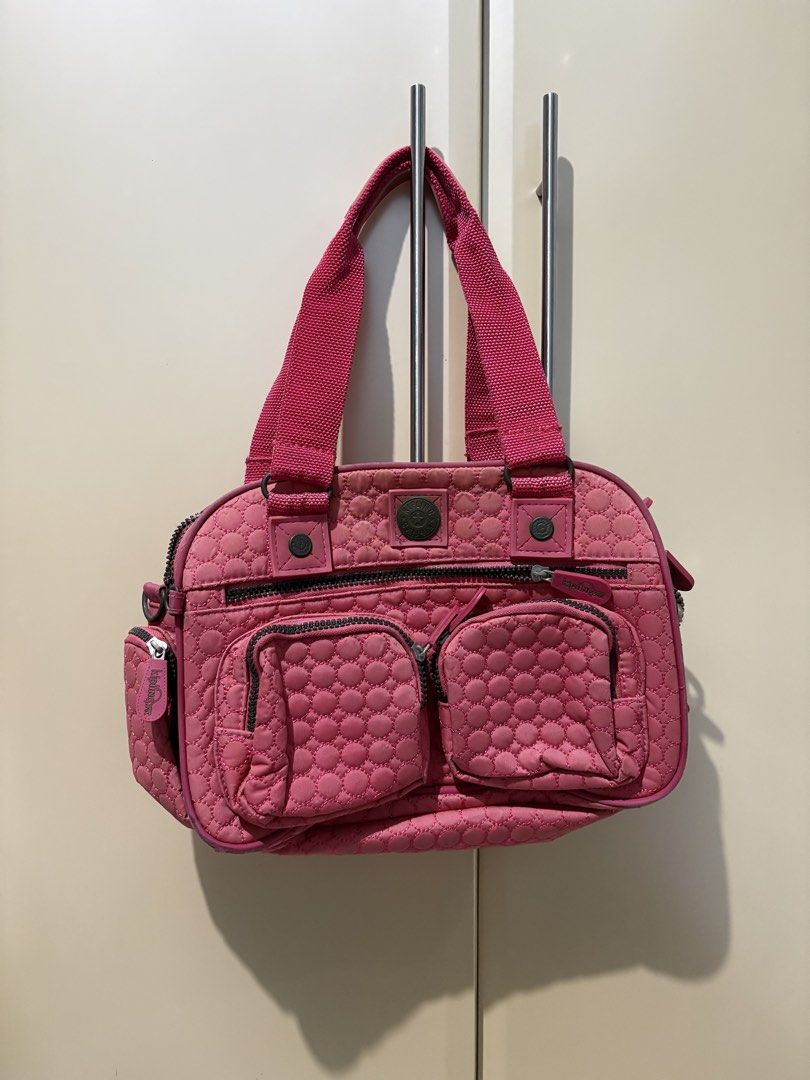 Kipling pastel red bag (Category: Shoulder Bags) located in Taguig. Submitted by aliuy (Listing ID 1469102398, Image 1). Description: Authentic Kipling bag Rfs: decluttering Zipper is medyo maganit but working ▪️Shipping via J&T or Grab Express/Lalamove for MNL area; J&T for provinces ▪️No Shope.e checkout ▪️Location of item: Taguig ▪️Available as long as posted ▪️Last price as posted ▪️Not interested in swapping ▪️ Will hold reserved items for 2