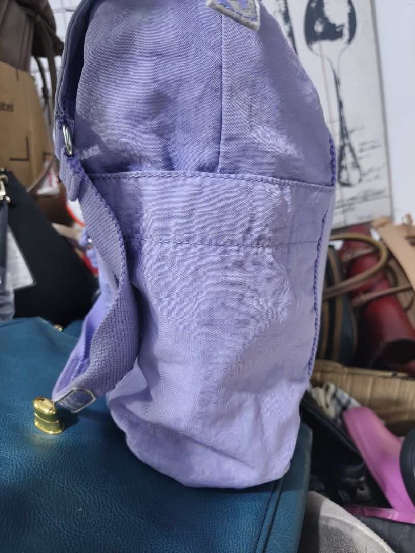 Kipling Purple Tote Shoulder Bag (Category: Tote Bags) located in Binan City. Submitted by makinpeso0622 (Listing ID 1468985861, Image 3). Description: - Authentic Kipling tote bag in a gorgeous light purple shade - Roomy interior, perfect for daily use, work, or school - Secure top zipper closure to keep your belongings safe - Sturdy shoulder straps for comfortable carrying - Convenient exterior side pockets for easy access - Inside features a z