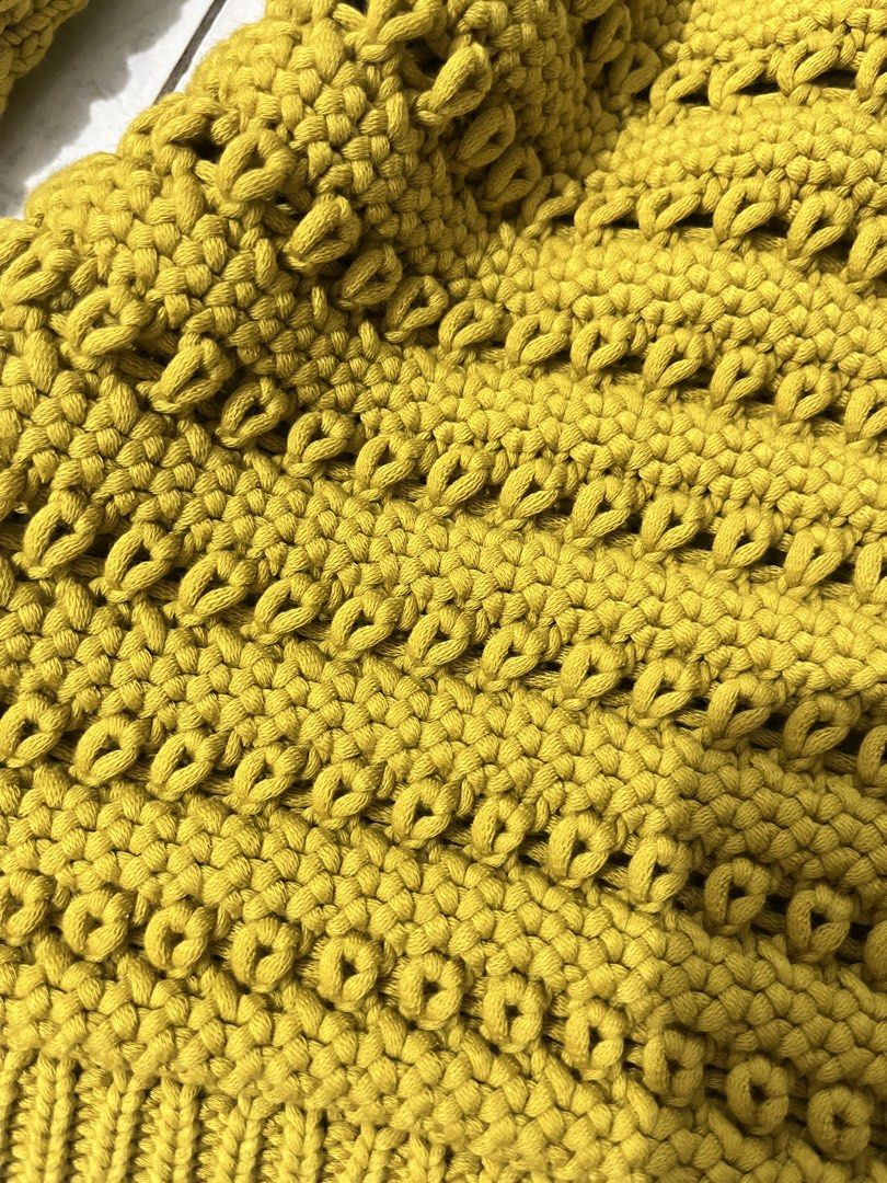 Knitter Mustard Yellow Sweater (Category: Coats, Jackets and Outerwear) located in Baguio. Submitted by TinortaPreloved (Listing ID 1468935719, Image 3). Description: Mustard Yellow Chunky Knit Sweater A cozy mustard yellow chunky knit sweater featuring a unique openwork design, a flattering V-neckline, and long sleeves. Designed with a relaxed fit, textured knit patterns, and ribbed cuffs and hem for a comfortable finish. The vibrant mustard sha