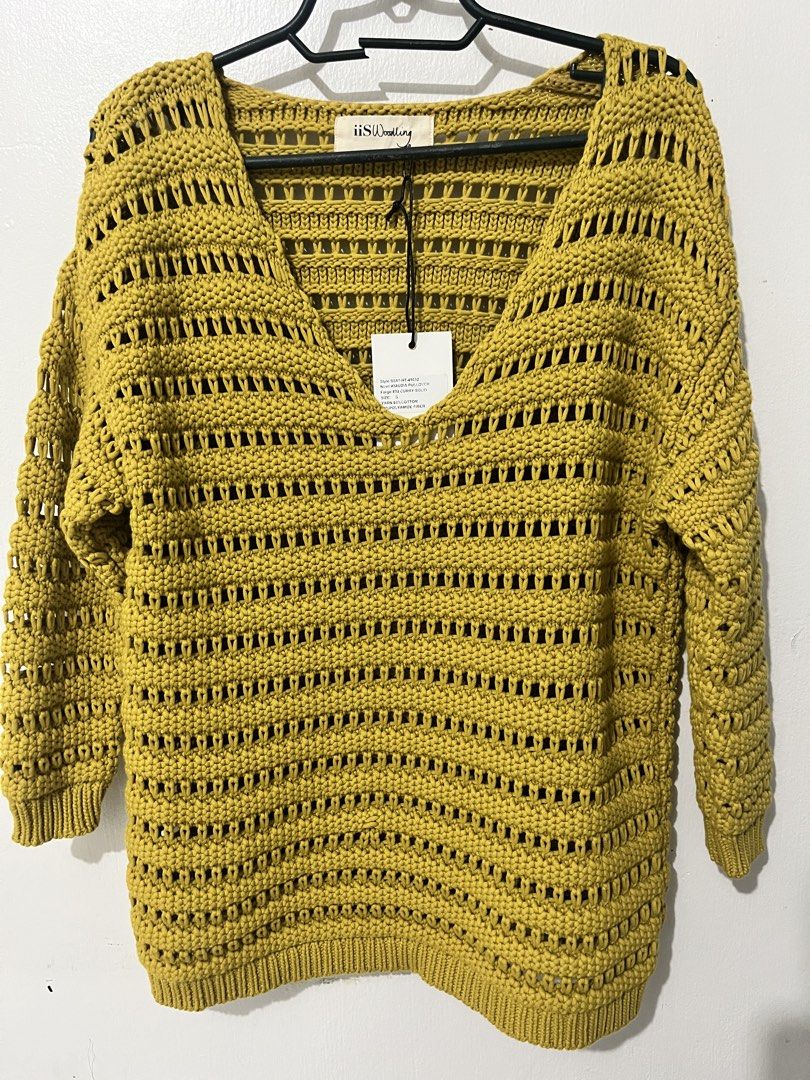 Knitter Mustard Yellow Sweater (Category: Coats, Jackets and Outerwear) located in Baguio. Submitted by TinortaPreloved (Listing ID 1468935719, Image 1). Description: Mustard Yellow Chunky Knit Sweater A cozy mustard yellow chunky knit sweater featuring a unique openwork design, a flattering V-neckline, and long sleeves. Designed with a relaxed fit, textured knit patterns, and ribbed cuffs and hem for a comfortable finish. The vibrant mustard sha