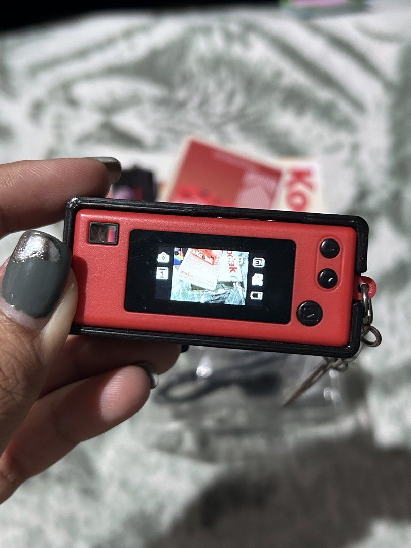Kodak Charmera 1987 Keychain Digital Camera (Category: Cameras) located in Manila. Submitted by mxveronicx (Listing ID 1469105521, Image 3). Description: Kodak Charmera 1987 keychain digital camera (Vintage collection) Condition: Used just once. Fully functional, screen turns on and shoots Inclusions: Original box, manual card, USB charging cable, 64GB Transcend micro SD card, and protective case .