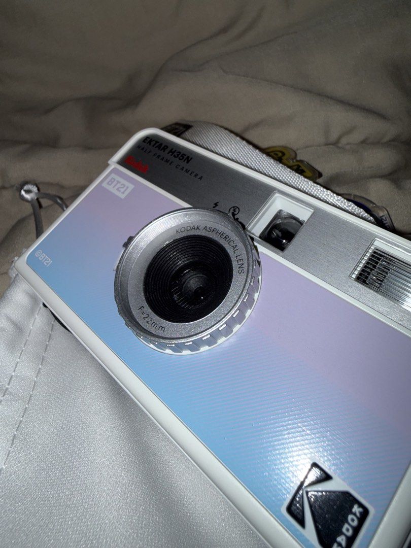 Kodak Ektar H35N BT21 Half Frame Camera Purple (Category: Cameras) located in Manila. Submitted by grandpenguin0925 (Listing ID 1469157498, Image 3). Description: - Kodak Ektar H35N half-frame film camera in limited BT21 special edition - Gorgeous pastel purple and blue gradient colorway with a sleek silver top plate - Shoots standard 35mm film and gets double the shots per roll - Equipped with a built-in flash and 22mm aspherical lens - Includes
