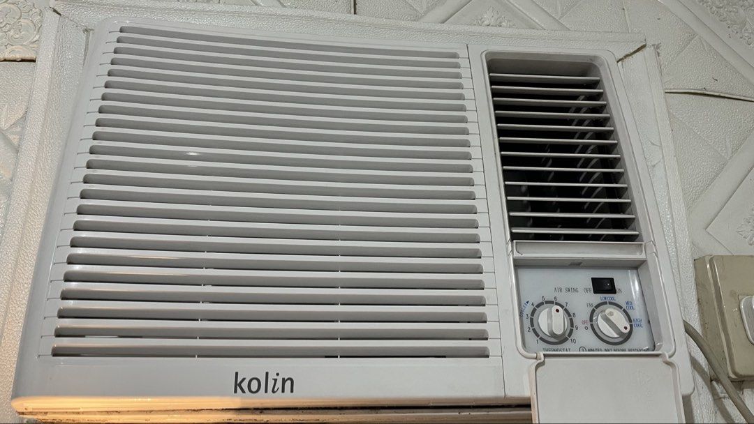 Kolin Window Type Air Conditioner 1.5hp (Category: Air Conditioning and Heating) located in Manila. Submitted by emkay2117 (Listing ID 1468945222, Image 1). Description: - Brand/Type: White Kolin window type air conditioner - Controls: Rotary dial controls for thermostat and fan speed - Features: Air swing switch and standard front panel louvers - Condition: Clean, well-maintained, and ready for installation.