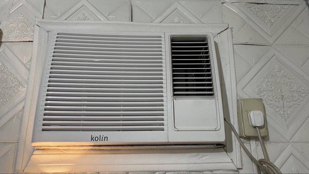 Kolin Window Type Air Conditioner 1.5hp (Category: Air Conditioning and Heating) located in Manila. Submitted by emkay2117 (Listing ID 1468945222, Image 3). Description: - Brand/Type: White Kolin window type air conditioner - Controls: Rotary dial controls for thermostat and fan speed - Features: Air swing switch and standard front panel louvers - Condition: Clean, well-maintained, and ready for installation.