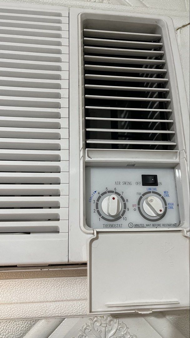 Kolin Window Type Air Conditioner 1.5hp (Category: Air Conditioning and Heating) located in Manila. Submitted by emkay2117 (Listing ID 1468945222, Image 2). Description: - Brand/Type: White Kolin window type air conditioner - Controls: Rotary dial controls for thermostat and fan speed - Features: Air swing switch and standard front panel louvers - Condition: Clean, well-maintained, and ready for installation.