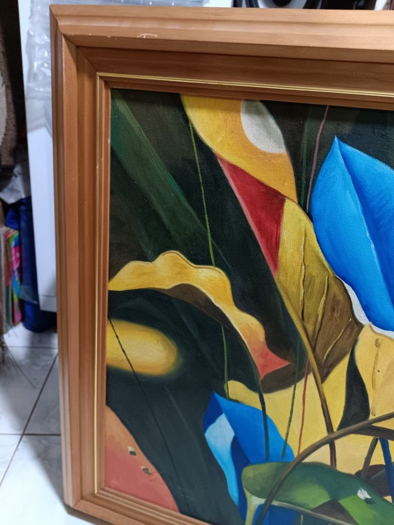 l Leaf Artwork Oil Painting Framed 2002 Severino (Category: Art & Prints) located in Manila. Submitted by caaths_collection (Listing ID 1469138508, Image 3). Description: - oil painting by Severino, dated 2002 - Vibrant tropical leaves design in blue, green, yellow, and red - Textured canvas with visible brushstrokes - Includes a sturdy wooden frame - Ready to hang - Perfect statement piece for living room or office decor.