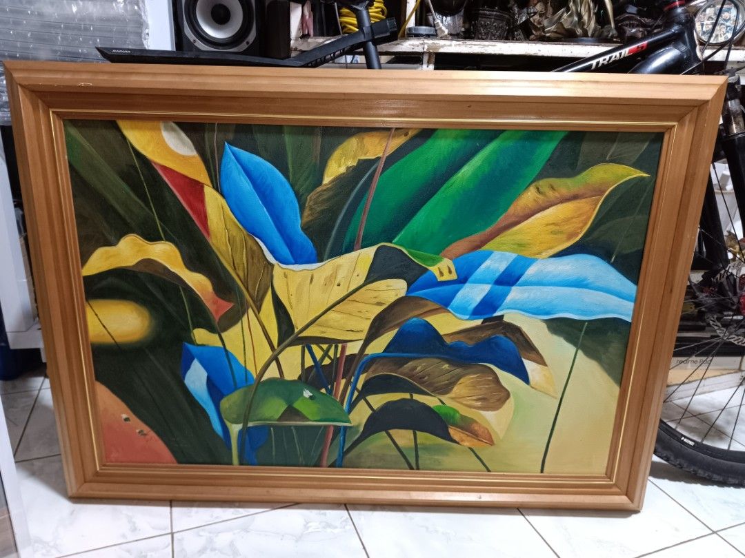 l Leaf Artwork Oil Painting Framed 2002 Severino (Category: Art & Prints) located in Manila. Submitted by caaths_collection (Listing ID 1469138508, Image 2). Description: - oil painting by Severino, dated 2002 - Vibrant tropical leaves design in blue, green, yellow, and red - Textured canvas with visible brushstrokes - Includes a sturdy wooden frame - Ready to hang - Perfect statement piece for living room or office decor.