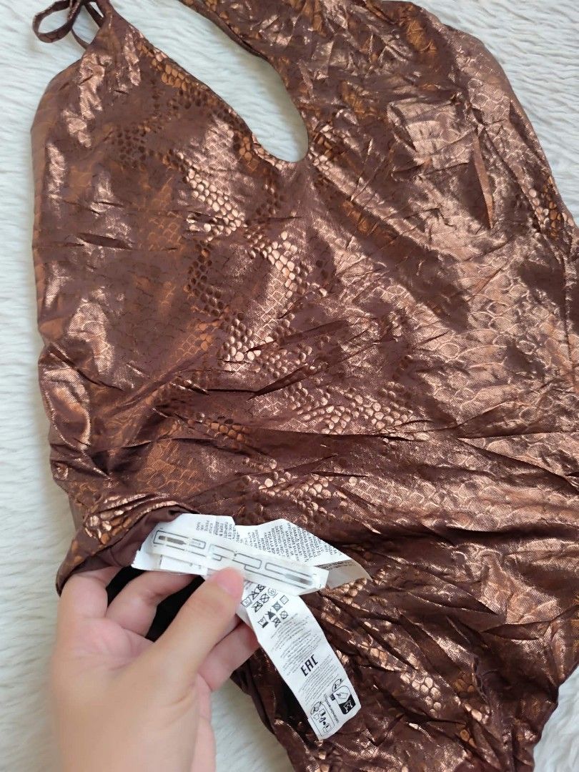 (L) Tezenis Monospalla Bronze Bodysuit (Category: Bikinis & Swimsuits) located in Paranaque City. Submitted by sl_shop05 (Listing ID 1468947027, Image 3). Description: 🌻Like New🌻 🌼Brand: TEZENIS ➡️No Pads ✨Size: Large ❎𝑨𝒍𝒍 𝒊𝒕𝒆𝒎𝒔 𝒂𝒓𝒆 𝑷𝑹𝑬𝑳𝑶𝑽𝑬𝑫 𝒊𝒏 𝑮𝒐𝒐𝒅 𝑪𝒐𝒏𝒅𝒊𝒕𝒊𝒐𝒏 ❎𝑷𝒍𝒆𝒂𝒔𝒆 𝒅𝒐 𝒎𝒂𝒏𝒂𝒈𝒆 𝒚𝒐𝒖𝒓 𝒆𝒙𝒑𝒆𝒄𝒕𝒂𝒕𝒊𝒐𝒏𝒔. ❎𝑾𝑨𝑺𝑯 𝒃𝒆𝒇𝒐𝒓𝒆 𝑼𝑺𝑬‼️ ❎𝑩𝑼𝒀 𝒂𝒕 𝒚𝒐𝒖𝒓 𝒐𝒘𝒏 𝒓𝒊𝒔𝒌‼️ ❎𝑵𝑶 𝑹𝑬𝑻𝑼