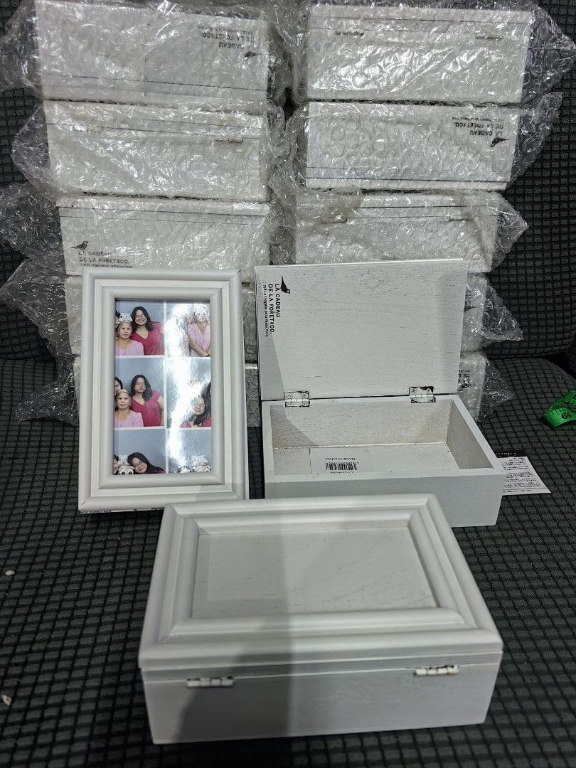 La Cadeau de la Foret Co. White Wooden Box (Category: Accessory Holder, Box & Organizers) located in Rizal. Submitted by gkstcenit (Listing ID 1468936607, Image 1). Description: - Brand: La Cadeau de la Foret Co. - Material: White wood with metal latches and hinged lid - Details: Stamped branding inside the lid - Condition: Brand new, still in bubble wrap with original box tags - Availability: Multiple pieces available - Use: Ideal decorative sto