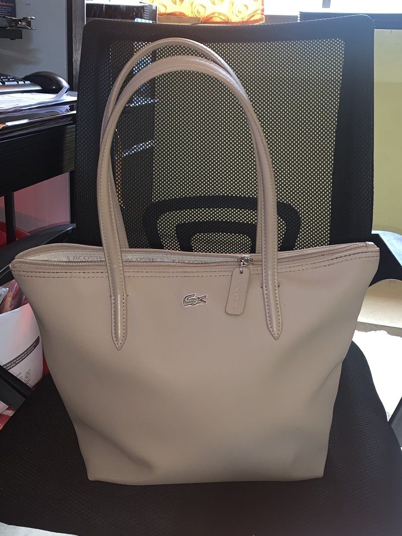 Lacoste Beige Tote Bag (Category: Tote Bags) located in Manila. Submitted by kuuurooomiii (Listing ID 1468978827, Image 1). Description: orig lacoste bag. can do meet up if arount manila/españa pm for more deets..