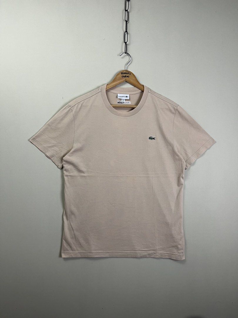 Lacoste Beige T-Shirt Size US Medium (Category: Shirts) located in Malaybalay. Submitted by toffee_s_thrift0.1 (Listing ID 1469052011, Image 1). Description: - Authentic Classic Lacoste T-Shirt - Colorway: Versatile Beige - Size: US Medium / FR 4 - Material: 100% breathable and comfortable cotton - Features: Iconic embroidered crocodile logo on the left chest - Condition: Clean neckline and neat stitching throughout - Style: Simple staple piece, 