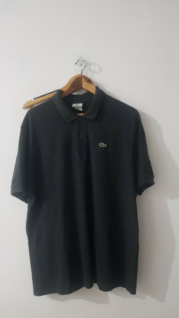Lacoste Black Polo Shirt (Category: Tshirts & Polo Shirts ) located in Manila. Submitted by nice430 (Listing ID 1469081148, Image 1). Description: - Brand: Lacoste - Color: Classic Black with green embroidered crocodile logo - Fit: Standard fit, short sleeves - Details: Classic collar, button placket, ribbed collar and sleeve cuffs - Material: Clean, comfortable dark wash cotton - Style: Great for daily casual wear.