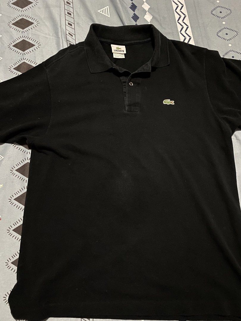 Lacoste Black Polo Shirt Size 5 Devanlay (Category: Tshirts & Polo Shirts ) located in Taguig. Submitted by maaarrrrrcky (Listing ID 1469069499, Image 1). Description: - Brand: Lacoste - Color: Black - Size: 5 (Regular Fit) - Material: Cotton petit piqué - Details: Classic two-button placket with mother-of-pearl buttons, iconic embroidered green crocodile logo - Origin: Designed in France, made in El Salvador by Devanlay - Condition: Clean collar