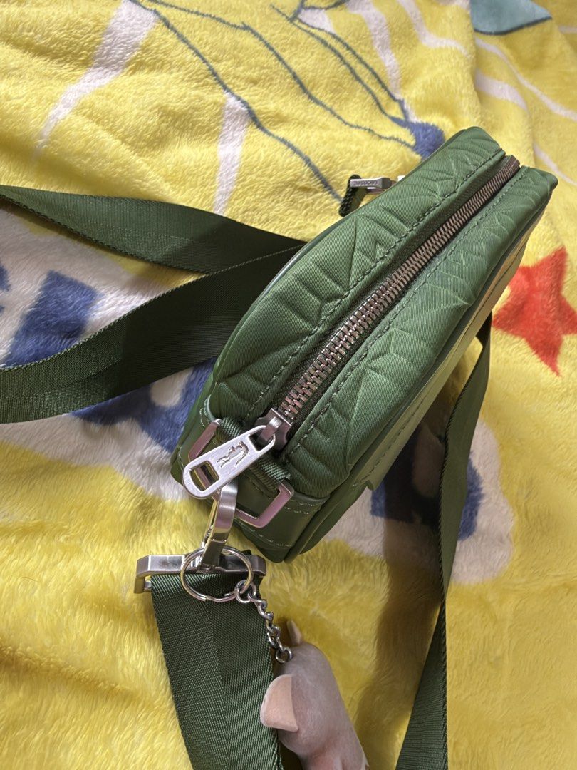 Lacoste Green Crossbody Camera Bag - original (Category: Cross-body Bags) located in Manila. Submitted by hammiedos (Listing ID 1468966013, Image 3). Description: - Quilted green Lacoste crossbody bag - Adjustable strap for comfortable wear - Secure zipper closure - Interior Lacoste logo tag - Ideal for everyday essentials -original -unli check if you want Location sampaloc manila.