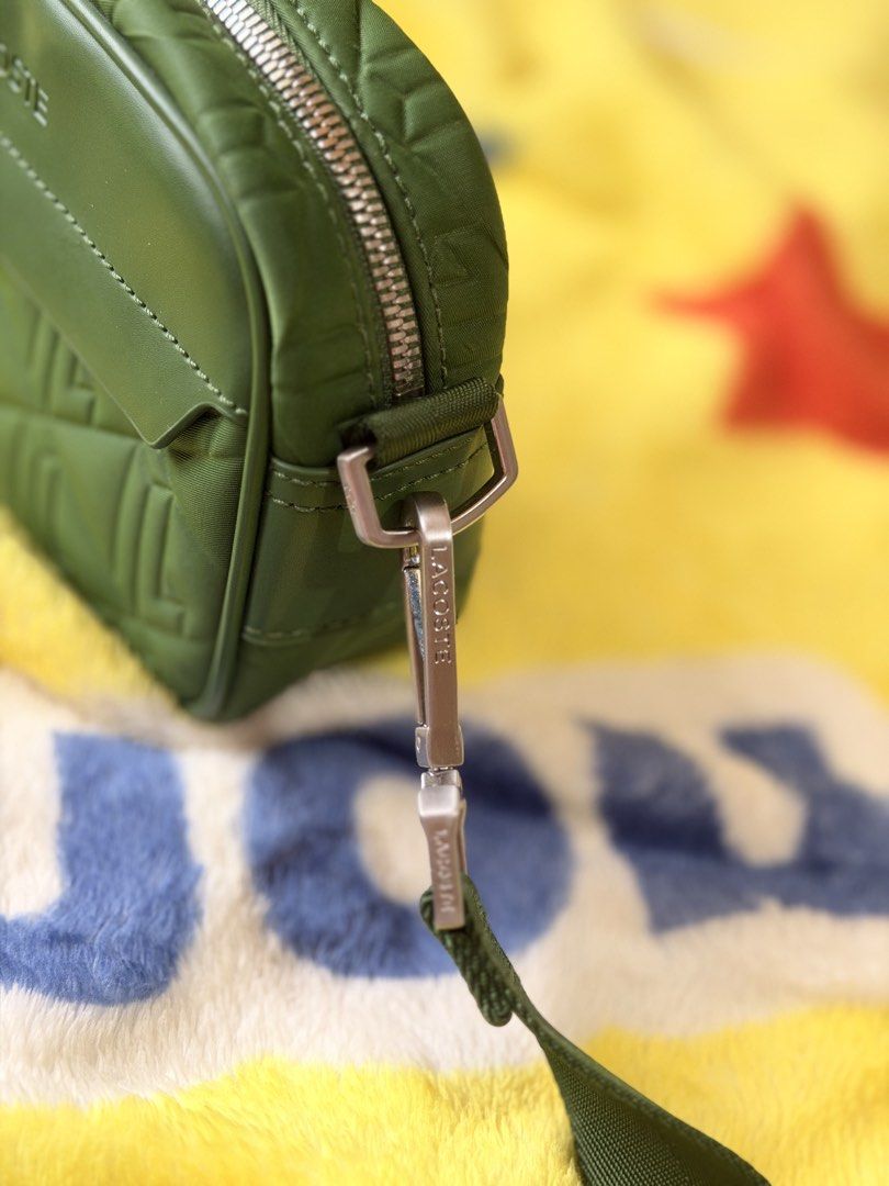 Lacoste Green Crossbody Camera Bag - original (Category: Cross-body Bags) located in Manila. Submitted by hammiedos (Listing ID 1468966013, Image 2). Description: - Quilted green Lacoste crossbody bag - Adjustable strap for comfortable wear - Secure zipper closure - Interior Lacoste logo tag - Ideal for everyday essentials -original -unli check if you want Location sampaloc manila.