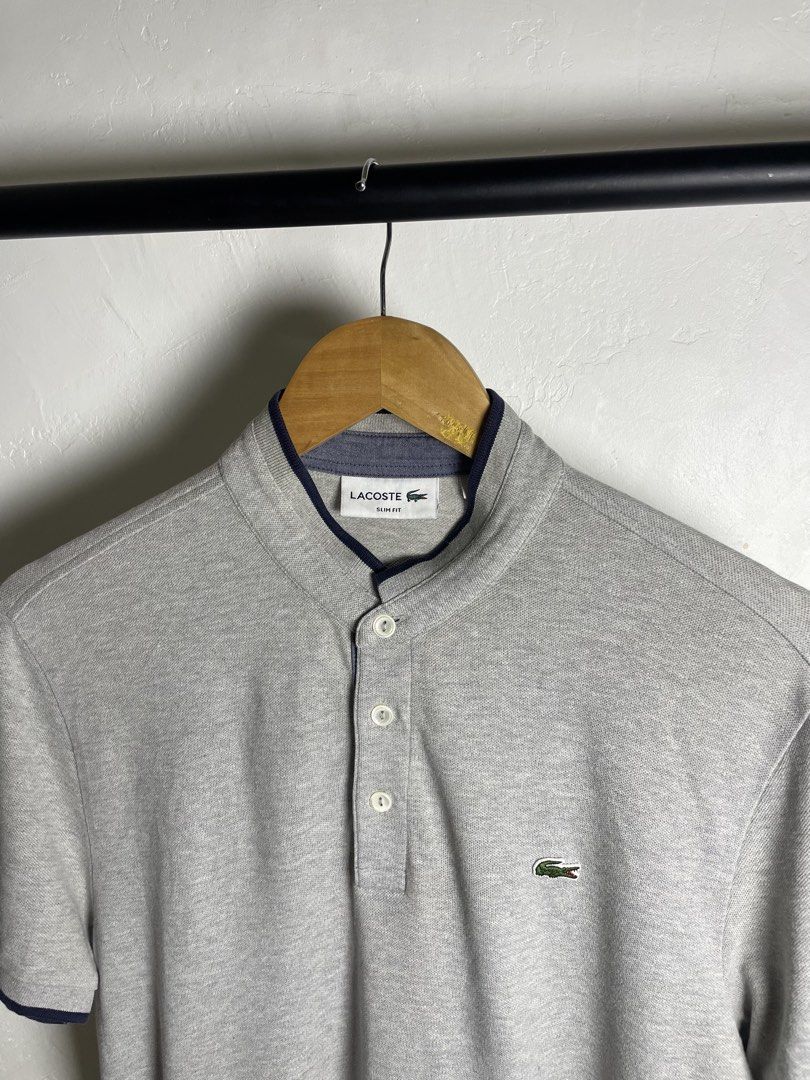 Lacoste grey solid Chinese collar shirt (Category: Tshirts & Polo Shirts ) located in Cebu City. Submitted by thrifted.john (Listing ID 1469161021, Image 2). Description: Lacoste grey solid Chinese collar shirt - Legit Authentic - Size 4 on tag - Dimes: W20 / L28 - Excellent / Asnew - 10/10 colorate & condition - no issue 1,580 Loc: Cebu Unli Vc, Vouch.