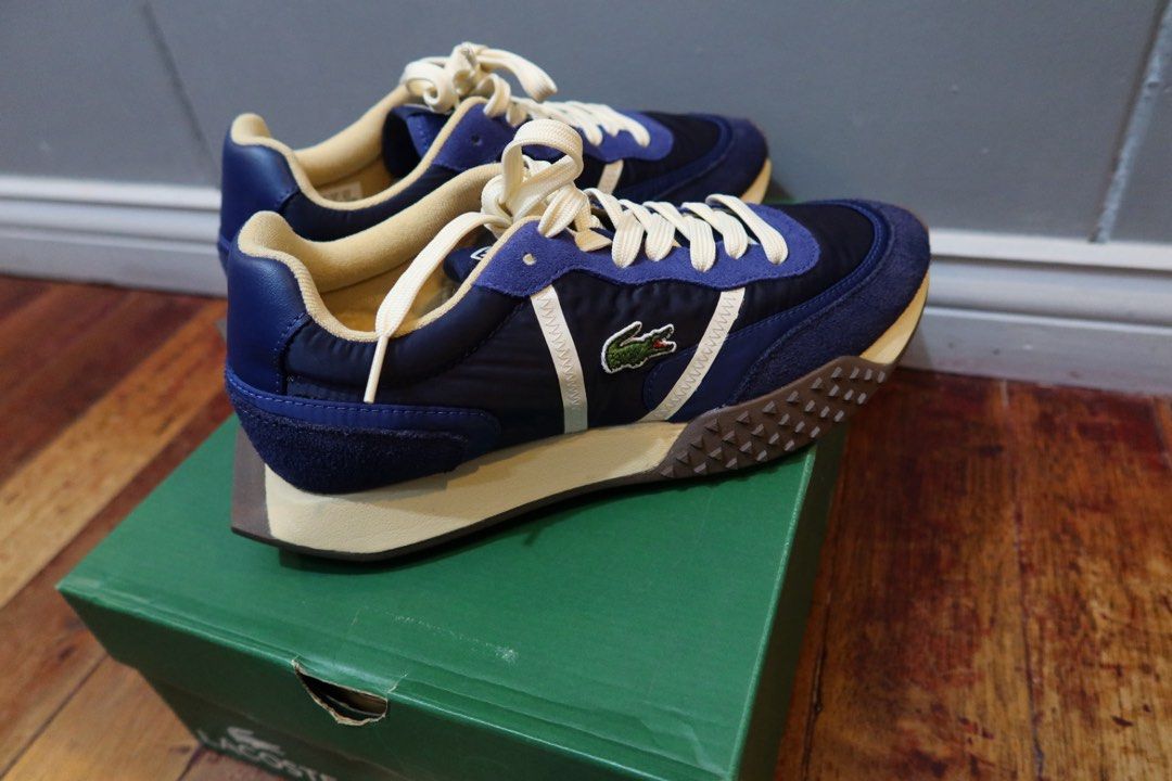 Lacoste L-Spin Deluxe Navy Blue Sneakers (Category: Casual Shoes) located in Pasay City. Submitted by royce.mata.24 (Listing ID 1469094282, Image 1). Description: - Used twice only - Good as new, no signs of use - Model: Lacoste L-Spin Deluxe - Colorway: Navy Blue and Cream - Material: Premium textile and suede upper with chunky textured rubber sole - Details: Signature stitched crocodile logo, cream laces, and matching lining - Inclusions: Compl