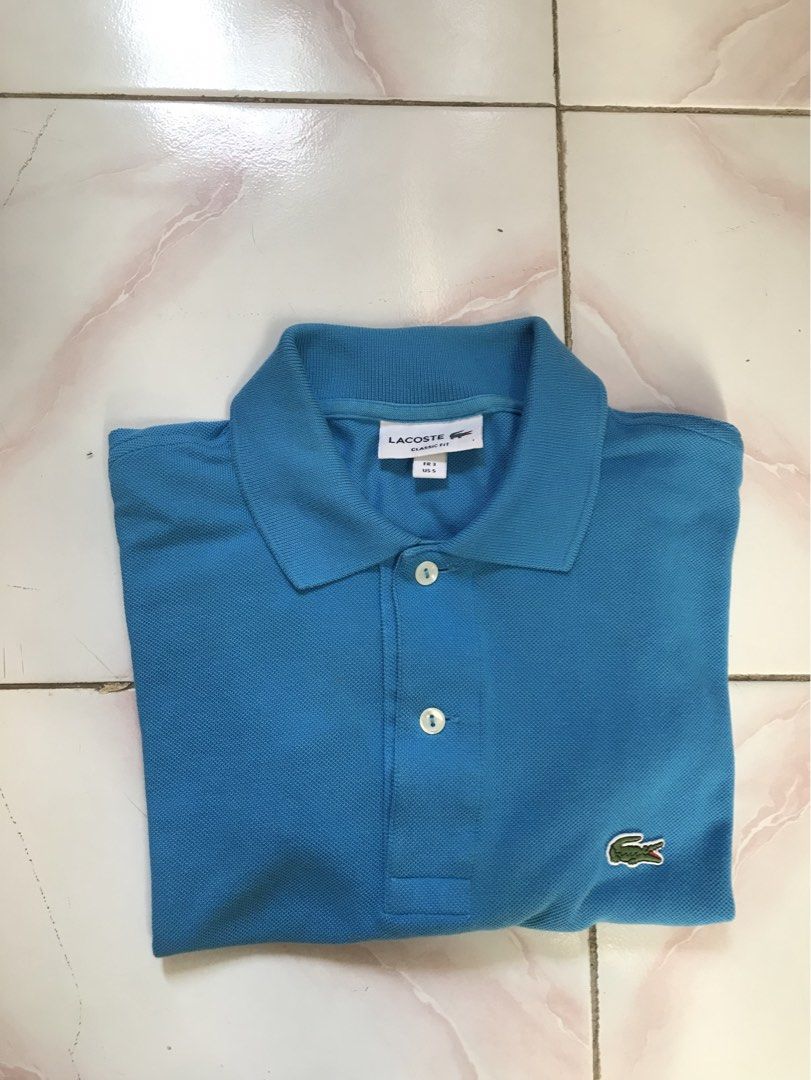 LACOSTE POLO (Category: Activewear) located in Manila. Submitted by crismil1 (Listing ID 1469113465, Image 1). Description: DIMES 28 LENGTH 19.5 WIDTH NO ISSUE AS NEW CONDITION .