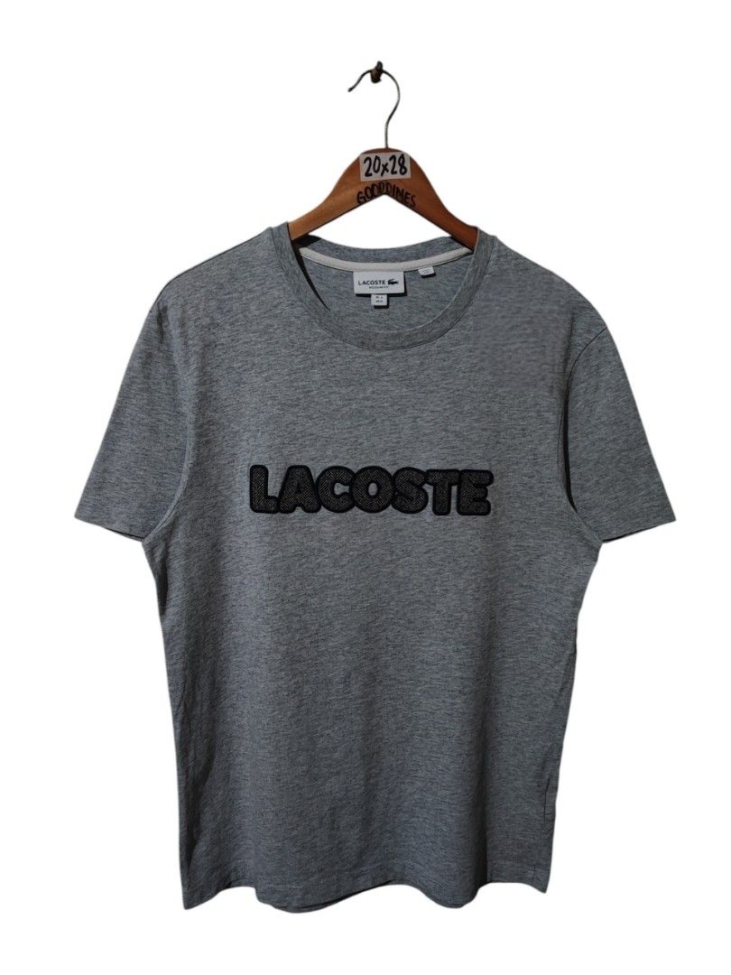 LACOSTE SPELLOUT LOGO T-SHIRT (Category: Tshirts & Polo Shirts ) located in Iloilo. Submitted by gooddimes (Listing ID 1469109502, Image 1). Description: Lacoste Spellout Logo T-Shirt Authentic Embroidery Patch Logo Size on tag: 4 or Medium Dimes: 20x28L Issue/s: None Color rate: 10/10 Like new condition ₱2,000 +Shipping fee J&T Express Shipping Fees Small Pouch - 85 Medium Pouch - 130 Large Pouch - 160 Reminders: - All items are thrifted, please