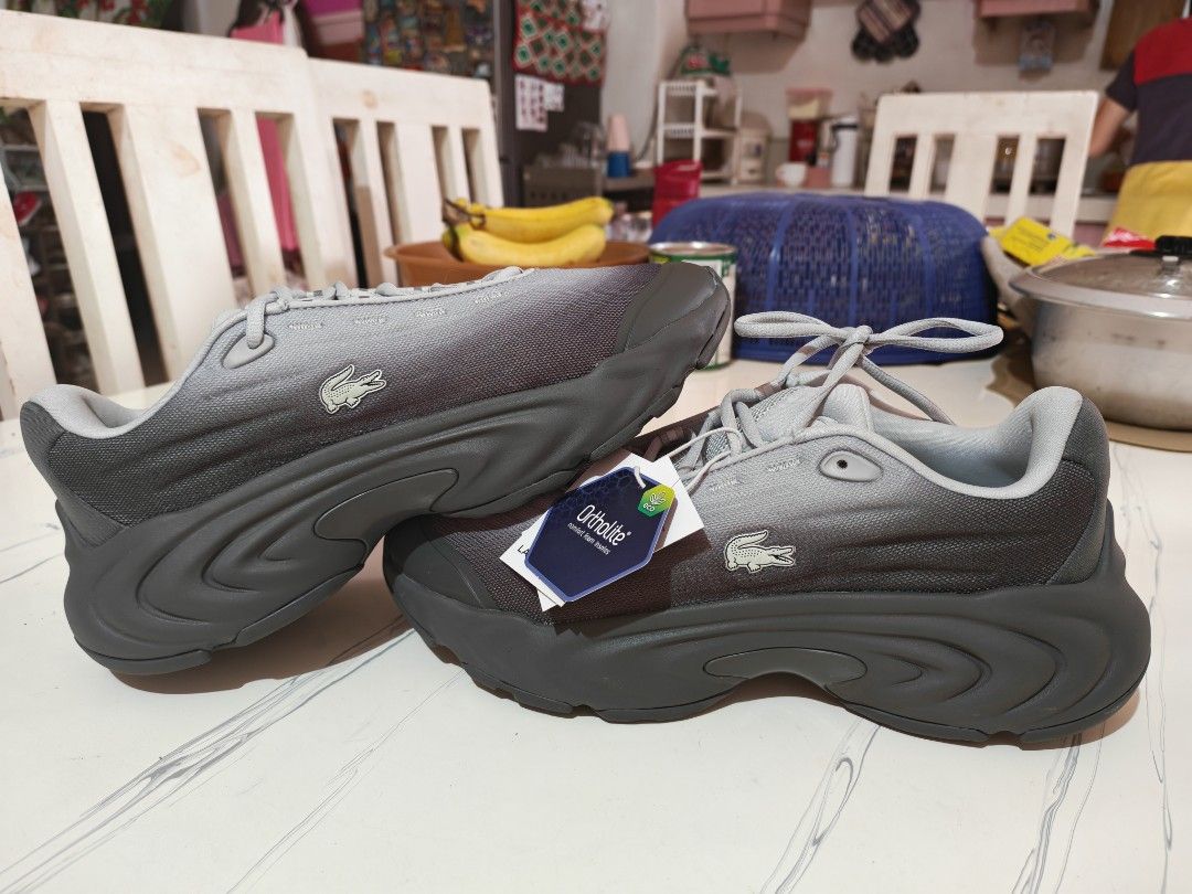 Lacoste Spinor Logo Low Top Sneakers Grey (Category: Sneakers) located in Cebu City. Submitted by rednug (Listing ID 1468952340, Image 2). Description: - Brand: Lacoste - Model: Spinor Sneakers - Colorway: Grey gradient - Condition: Brand new with tags attached, never worn out - Comfort: Ortholite foam insoles for everyday wear - Design: Chunky midsole with signature side crocodile logo.