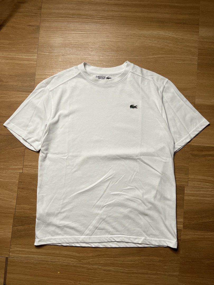 LACOSTE SPORT WHITE TEE (Category: Activewear) located in Cebu City. Submitted by gaston_roux (Listing ID 1468944812, Image 1). Description: 20.5x27 Good condition Needs wash.