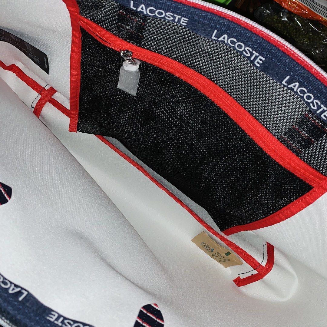 Lacoste Stripes Tote Bag (Category: Luxury Bags & Wallets) located in Manila. Submitted by yunotadashi (Listing ID 1469042665, Image 3). Description: ✨ Authentic Lacoste tote bag from the US! 🇺🇸 - Original price was almost ₱8,000 in the Philippines. - Still has the original bag tag and paper cover, but the plastic packaging is no longer available. - Never been used. The bag was originally gifted to my mom. - NO ISSUES❗️ RFS: Need money. 📍 Meet